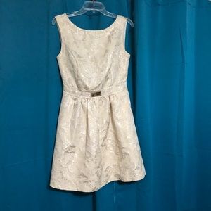 Jennifer Lopez mid length gold dress